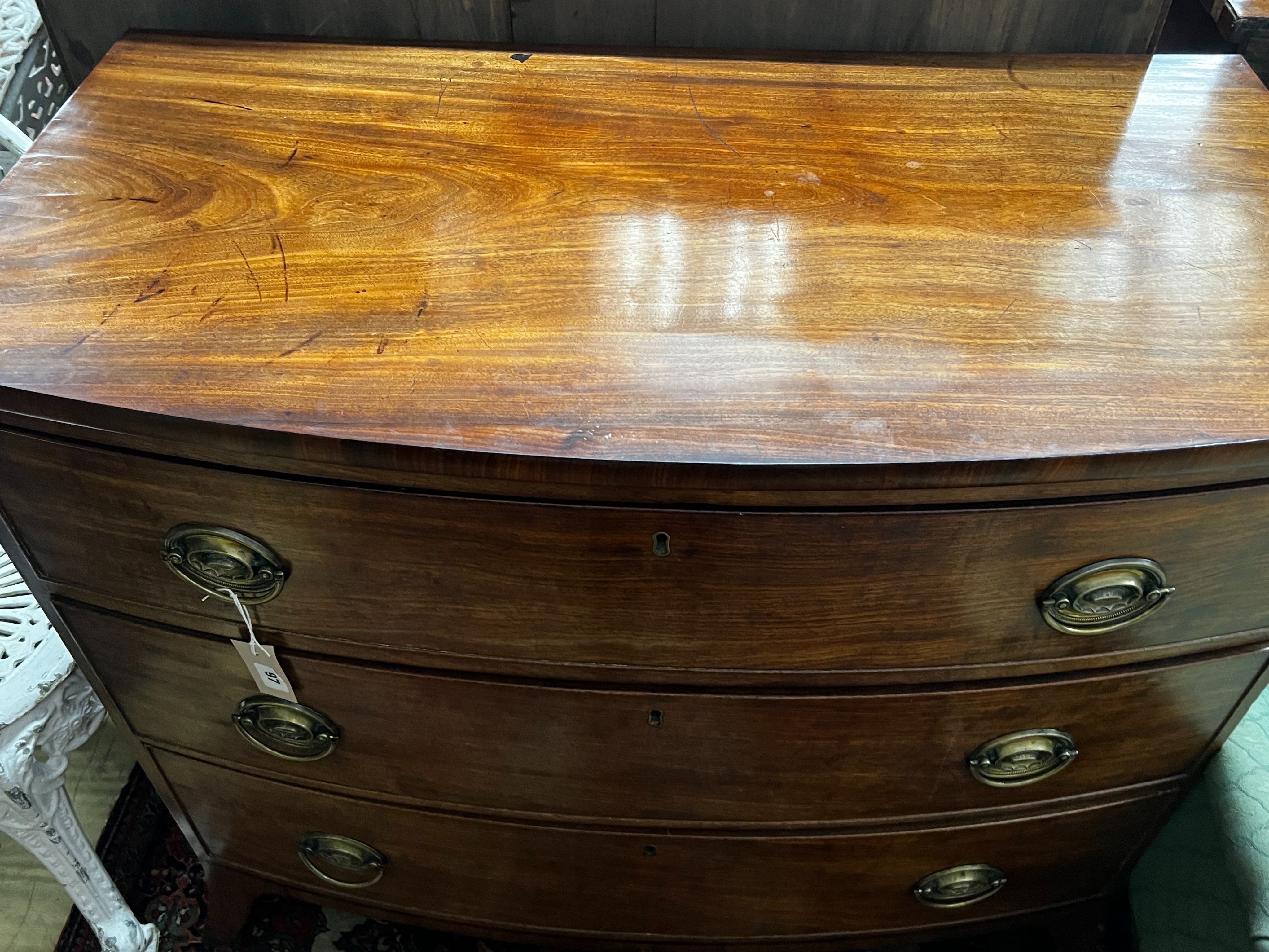A Regency mahogany bow fronted chest of three long graduated drawers, width 100cm, depth 53cm, height 89cm